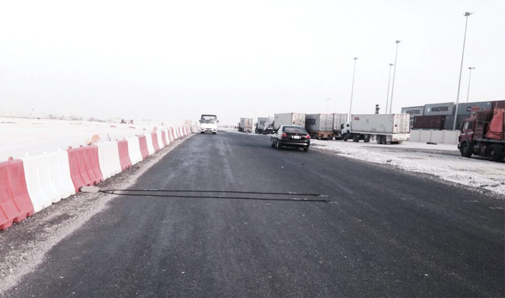 a truck is parked on the side of a road.